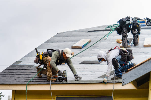 Professional Roofing technician working in Durham, OR